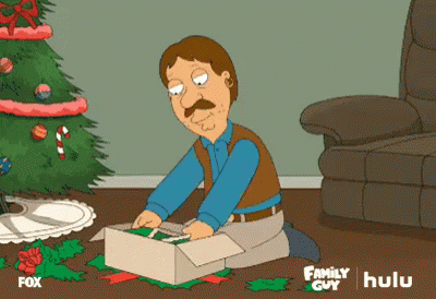 Guy opening presents